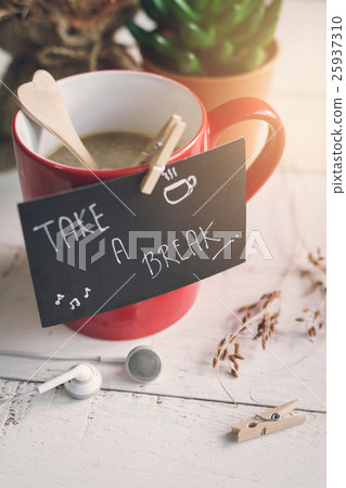 Red cup of coffee with take a break note 25937310
