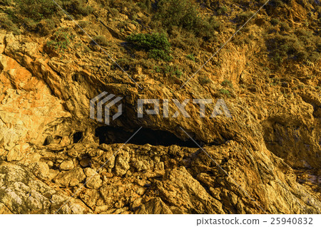 Closeup View on Rocky Mountain with Cave Closeup View on Rocky Mountain with Cave 25940832