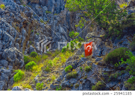 Turkish flag on tree in mountains 25941185