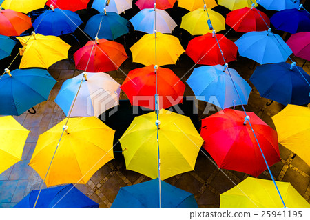 Decoration with open colorful umbrellas 25941195