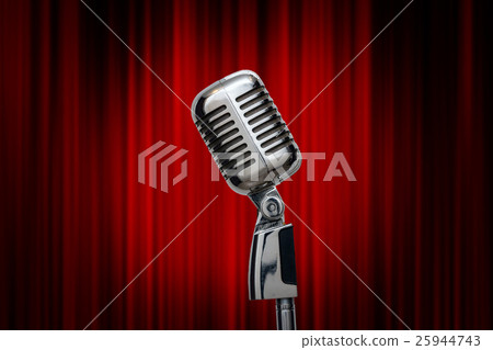 Retro microphone over the red curtain background, vintage musical concept Retro microphone over the red curtain background, vintage musical concept 25944743