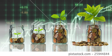 Gold coins and seed in clear bottle on Stock market exchange data on LED display background, Business investment growth and trading concept Gold coins and seed in clear bottle on Stock market exchange data on LED display background, Business investment growth and trading concept 25944844
