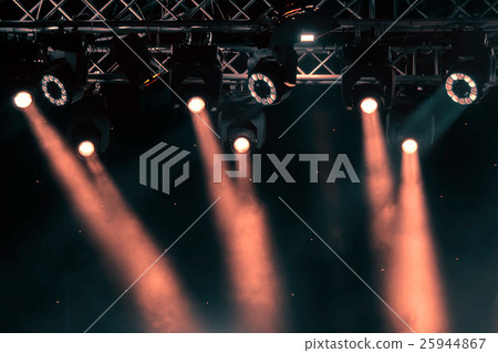 luminous rays from concert lighting against a dark background, musical instrument concept luminous rays from concert lighting against a dark background, musical instrument concept 25944867