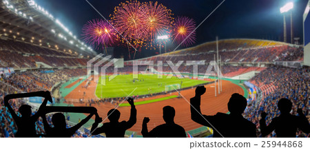 The silhouette of fan club over the panorama of Abstract blurred photo of fan sport at stadium with firework, sport background concept The silhouette of fan club over the panorama of Abstract blurred photo of fan sport at stadium with firework, sport background concept 25944868