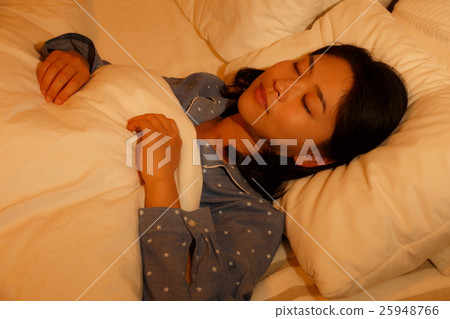 A woman sleeping A woman sleeping 25948766