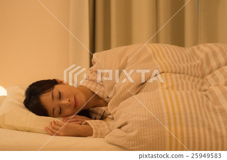 A woman sleeping 25949583