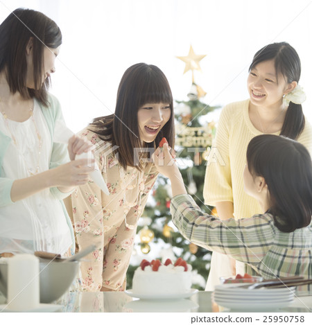 A woman making a cake 25950758