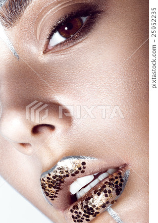 Beautiful fashionable girl with creative glitter 25952235