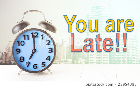 you are late text with blue alarm clock city 25954383