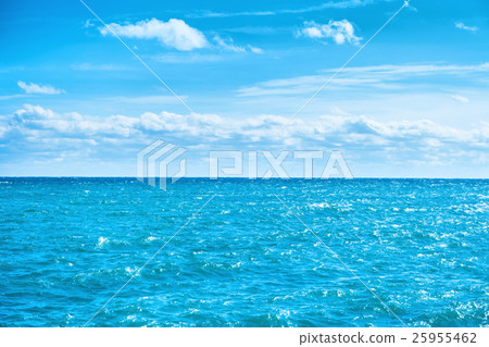 Sea water and blue sky with white clouds Sea water and blue sky with white clouds 25955462