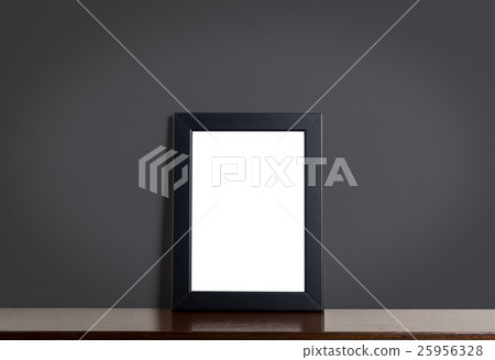 Empty Black photo frame on shelf gray background 25956328