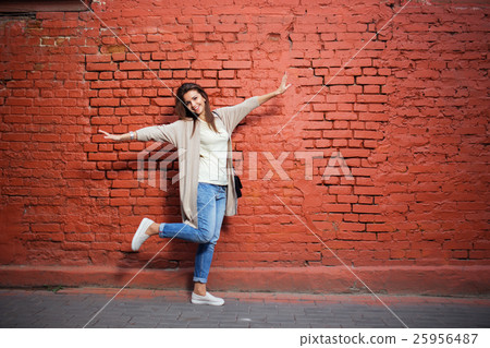 Young beautiful happy woman in casual cloths Young beautiful happy woman in casual cloths 25956487
