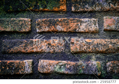 Dark Dirty brick wall full of dirt and moss Dark Dirty brick wall full of dirt and moss 25958777
