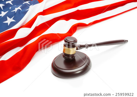 Wooden judge gavel near flag of USA Wooden judge gavel near flag of USA 25959922