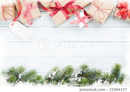 Christmas gift boxes and fir tree 25964337