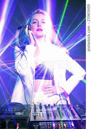 Beautiful blonde DJ girl on decks - the party, 25965609
