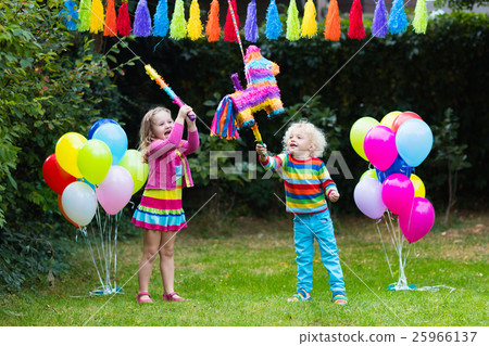 Kids playing with birthday pinata Kids playing with birthday pinata 25966137