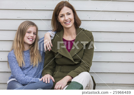 Happy Woman and girl Mother Daughter Smiling Happy Woman and girl Mother Daughter Smiling 25966489