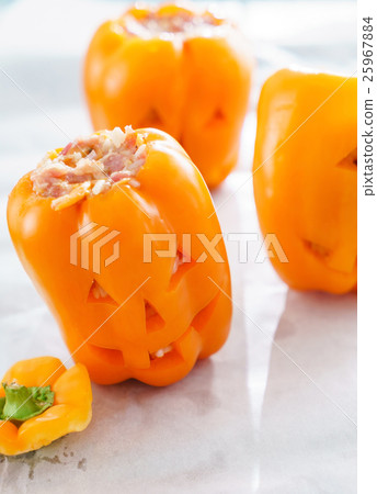 Halloween jack-o-lanterns filled with minced meat 25967884