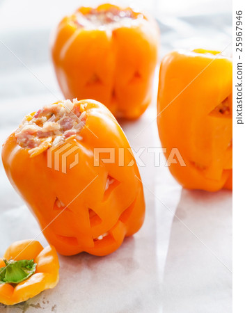 Halloween jack-o-lanterns filled with minced meat Halloween jack-o-lanterns filled with minced meat 25967946