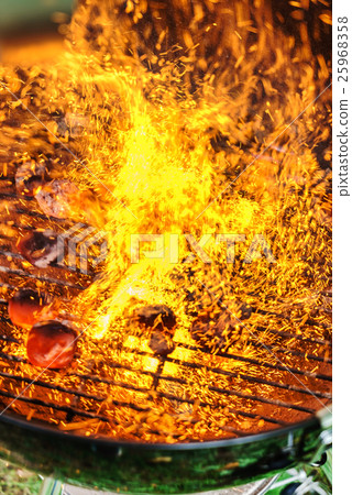 Glowing charcoal and flame Glowing charcoal and flame 25968358
