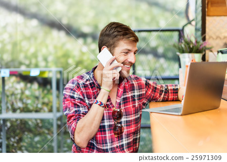 Young Man Using Browsing Smartphone Concept Young Man Using Browsing Smartphone Concept 25971309