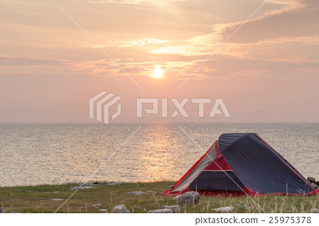 Tent on seashore in the morning Tent on seashore in the morning 25975378