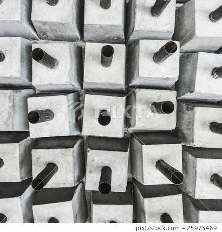 abstract iron post in concrete base background 25975469