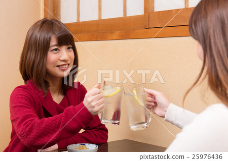 Young woman cheers image Young woman cheers image 25976436