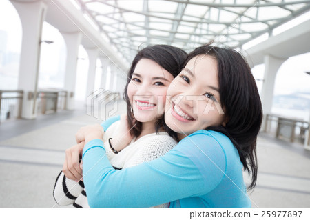 two beauty woman hug together 25977897