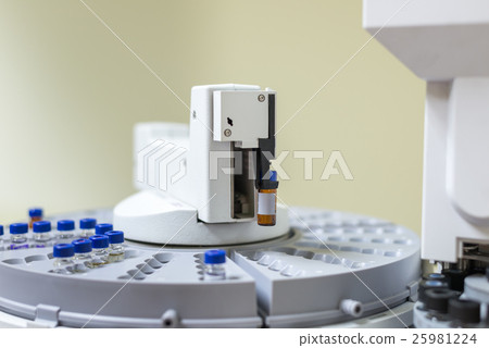 Vials in the autosampler tray. Chemistry lab Vials in the autosampler tray. Chemistry lab 25981224