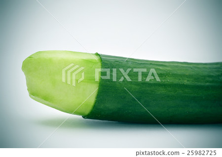 cucumber with the skin of its tip removed 25982725