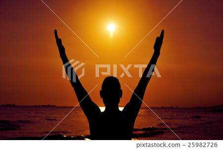 young man with his arms in the air young man with his arms in the air 25982726