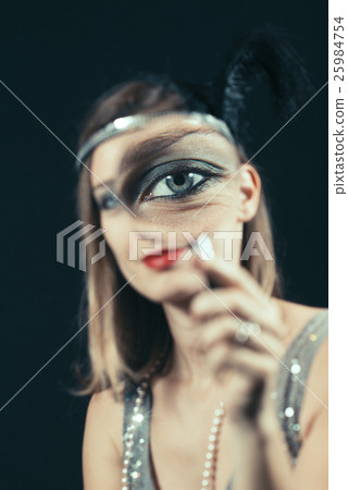 woman looks through the lens woman looks through the lens 25984754