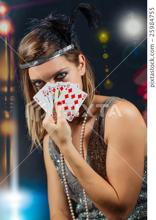 woman playing poker with scale 25984755