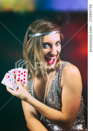 woman playing poker with scale woman playing poker with scale 25984756