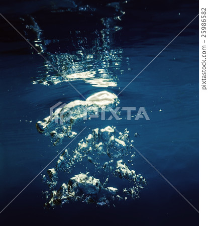 Air bubbles under water 25986582