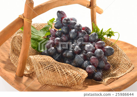 Fruits and vegetables in basket isolated on white 25986644