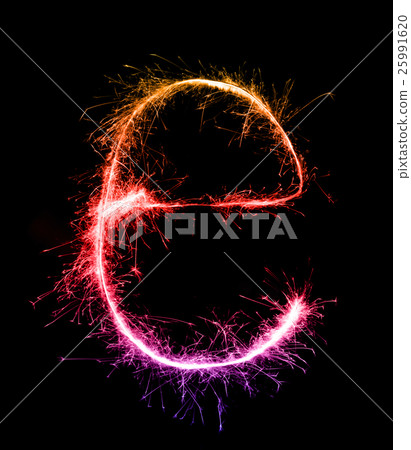 Sparkler firework light alphabet e at night Sparkler firework light alphabet e at night 25991620