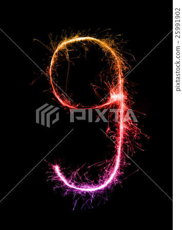 Sparkler firework light alphabet g at night 25991902
