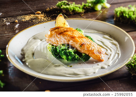 salmon steak with broccoli salmon steak with broccoli 25992055