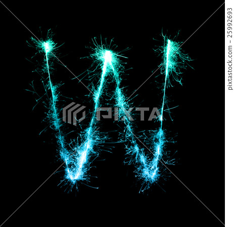 Sparkler firework light alphabet W at night 25992693