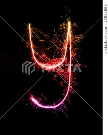 Sparkler firework light alphabet y at night 25992698