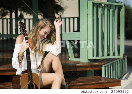 Guitar Girl Relaxation Casual Instrument Leisure Concept Guitar Girl Relaxation Casual Instrument Leisure Concept 25995322