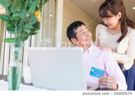 Middle couple, card settlement on the terrace Middle couple, card settlement on the terrace 26000974