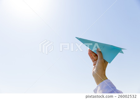 Blue paper airplane 26002532