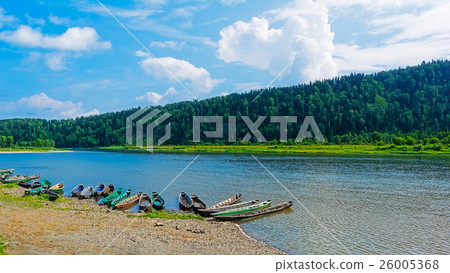 Beautiful river landscape with moored boats Beautiful river landscape with moored boats 26005368