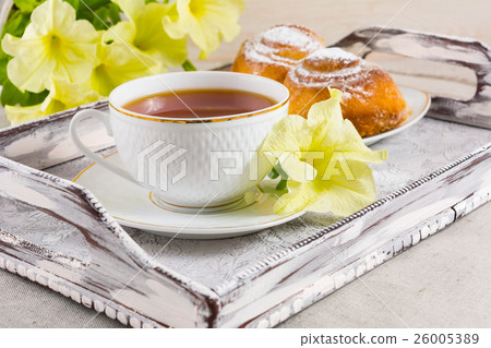 Breakfast Danish pastry and cup of tea on tray 26005389