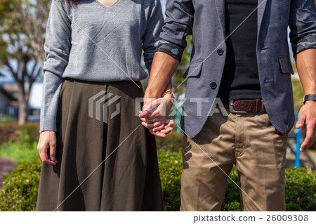 Two young couple hands up 26009308