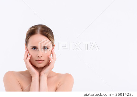 Sensual girl enjoying facial skincare treatment 26014283